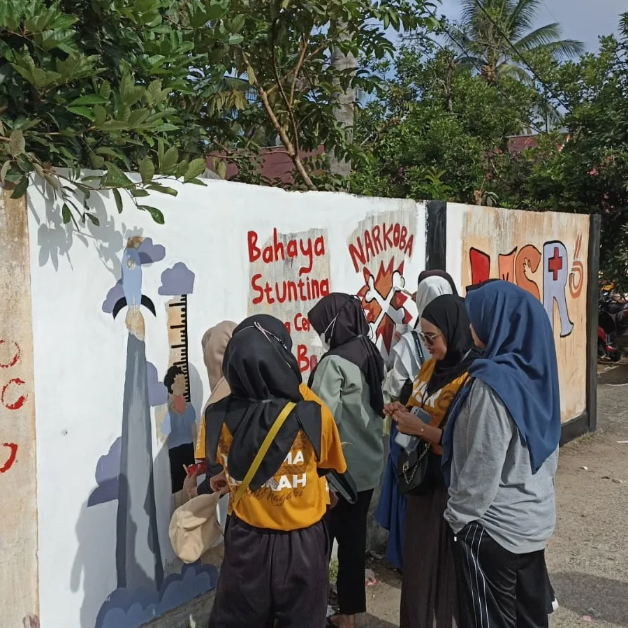 Kegiatan Mural atau coret coret tembok dengan cat menjadi bagian kegiatan USR 6 Unbrah Kabupaten Sijunjung 2022.